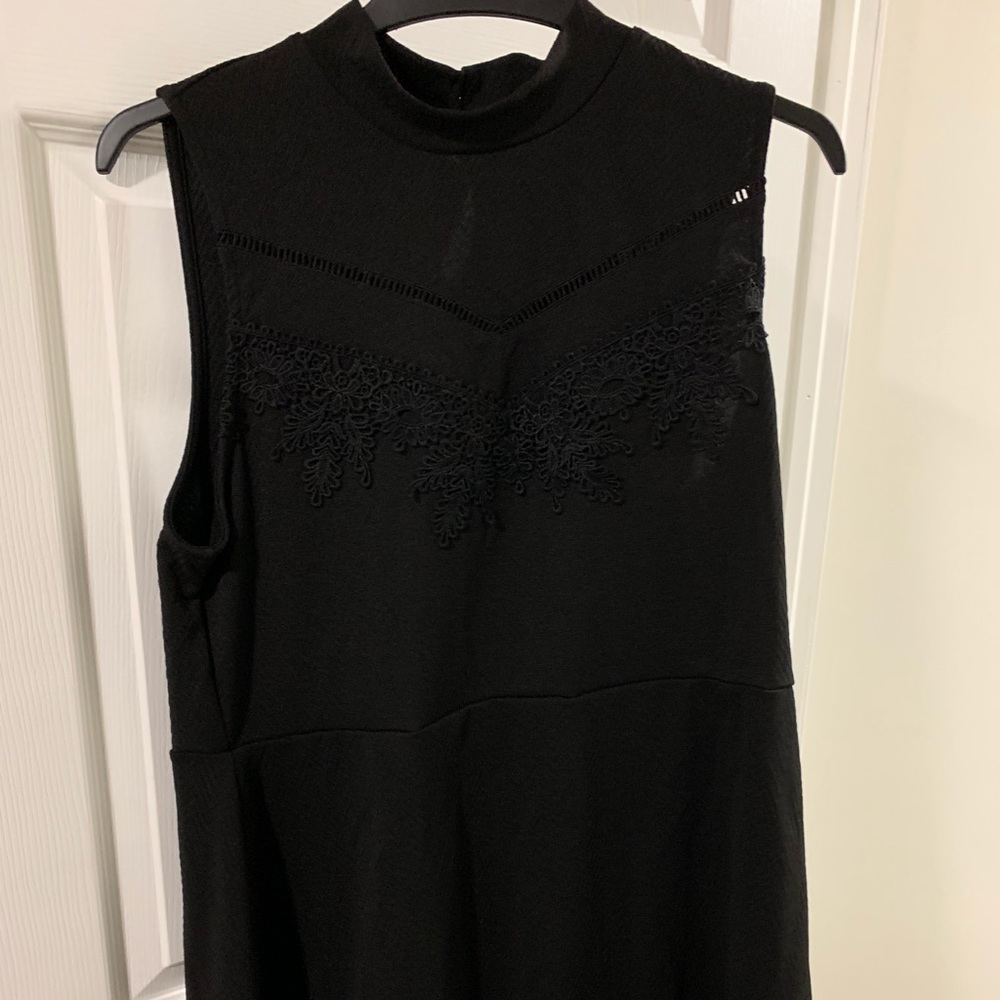 Black sleeveless skater dress